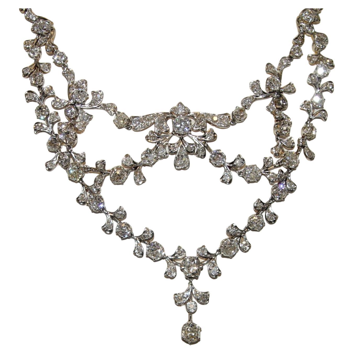 Gorgeous statement to the opulence of the Victorian Era. This necklace is in great wearable condition considering it's age. It is made from PLATINUM and 18K gold (not stamped but tested with state of the art alloy identifying equipment).  

This