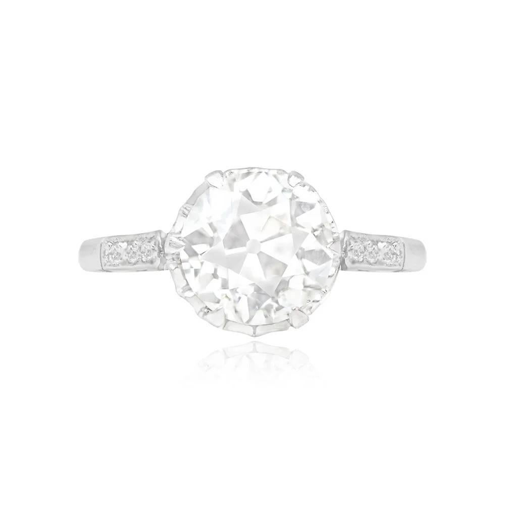 Graceful Art Deco engagement ring showcases a prong-set, 2.03-carat old European cut diamond (J color, VS1 clarity). Four additional old European cut diamonds, collectively weighing approximately 0.16 carats, accentuate the shoulders. The
