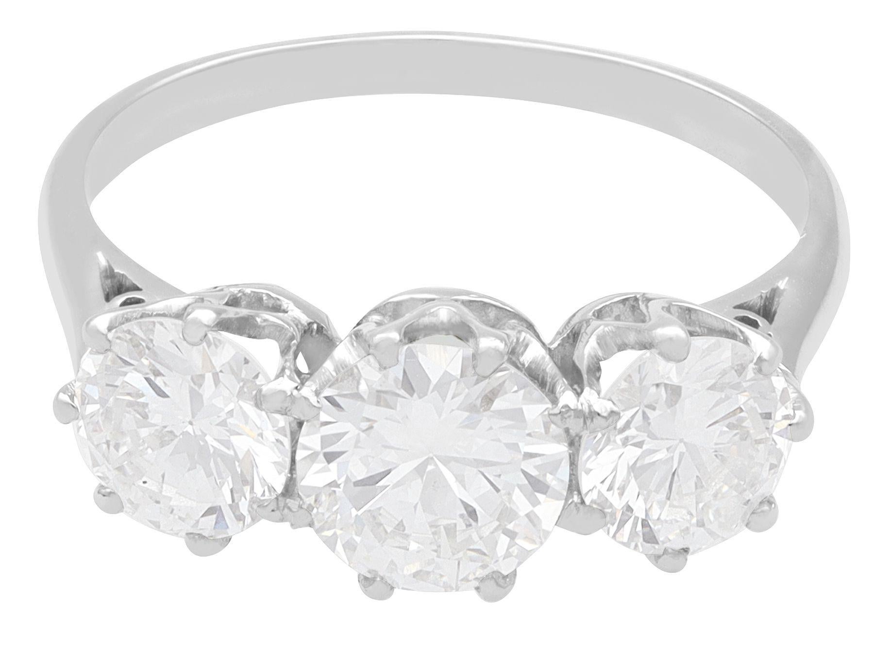 Round Cut Antique 2.05 Carat Diamond and Platinum Trilogy Engagement Ring