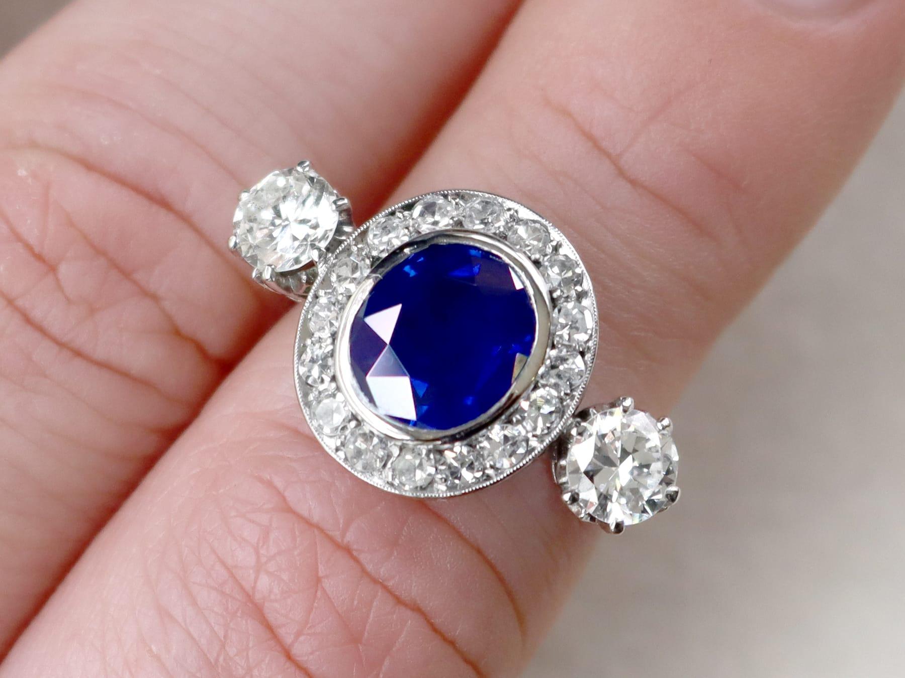 Oval Cut Antique 2.05 Carat Sapphire and 1.49 Carat Diamond, Platinum Ring Circa 1930 For Sale