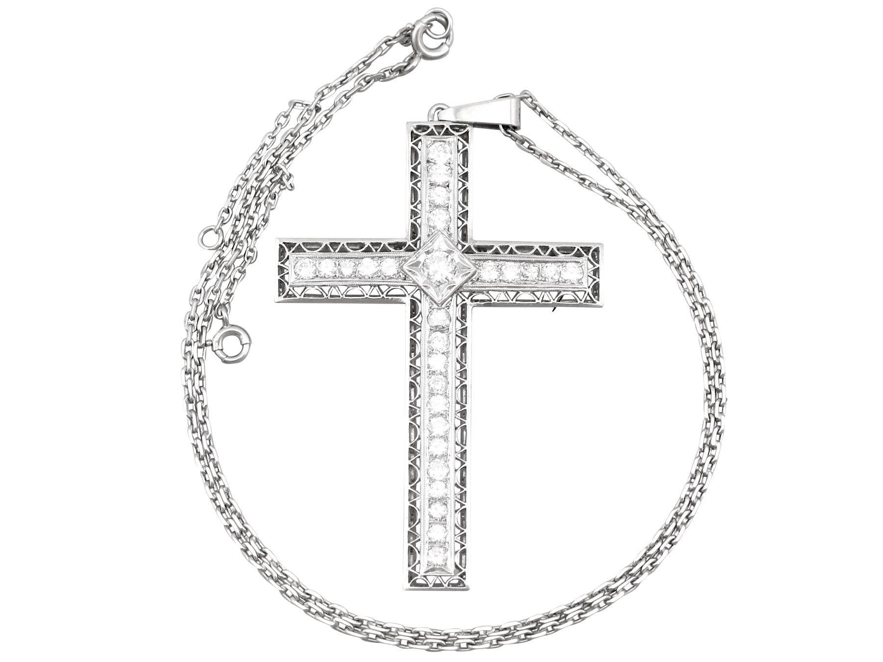 A stunning antique 1920s 2.07 carat diamond and platinum cross design pendant and chain; part of our diverse antique jewelry and estate jewelry collections.

This stunning, fine and impressive antique diamond pendant has been crafted in