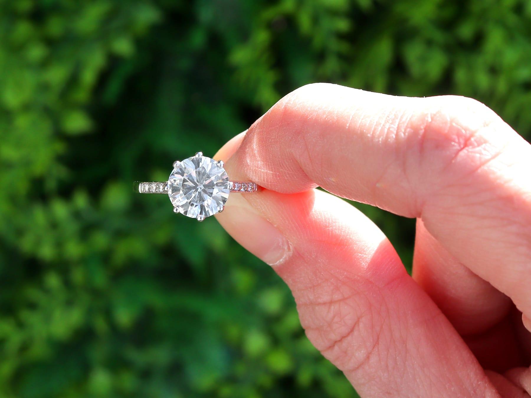 A stunning, fine and impressive antique 2.08 carat diamond and platinum solitaire engagement ring; part of our diverse jewelry and estate jewelry collections.

This stunning, fine and impressive diamond solitaire ring has been crafted in