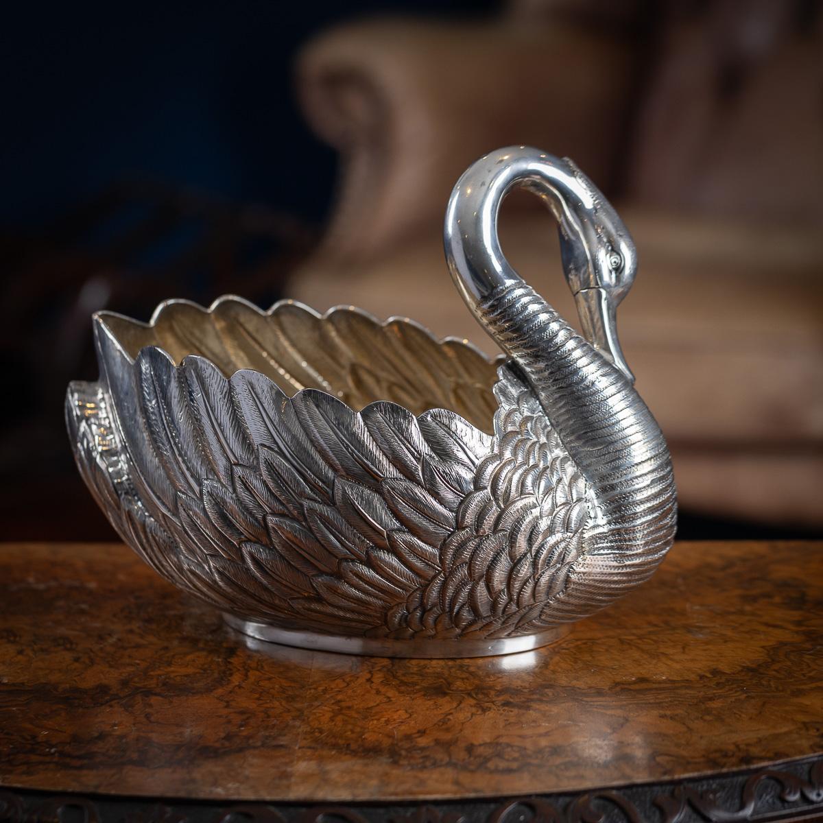 Antique early 20th Century very rare solid silver jardiniere by Tiffany & Co. Made in America, this piece serves beautifully as both a decorative object and a functional item for the dining table. The body is finely modelled as a swan, with detailed
