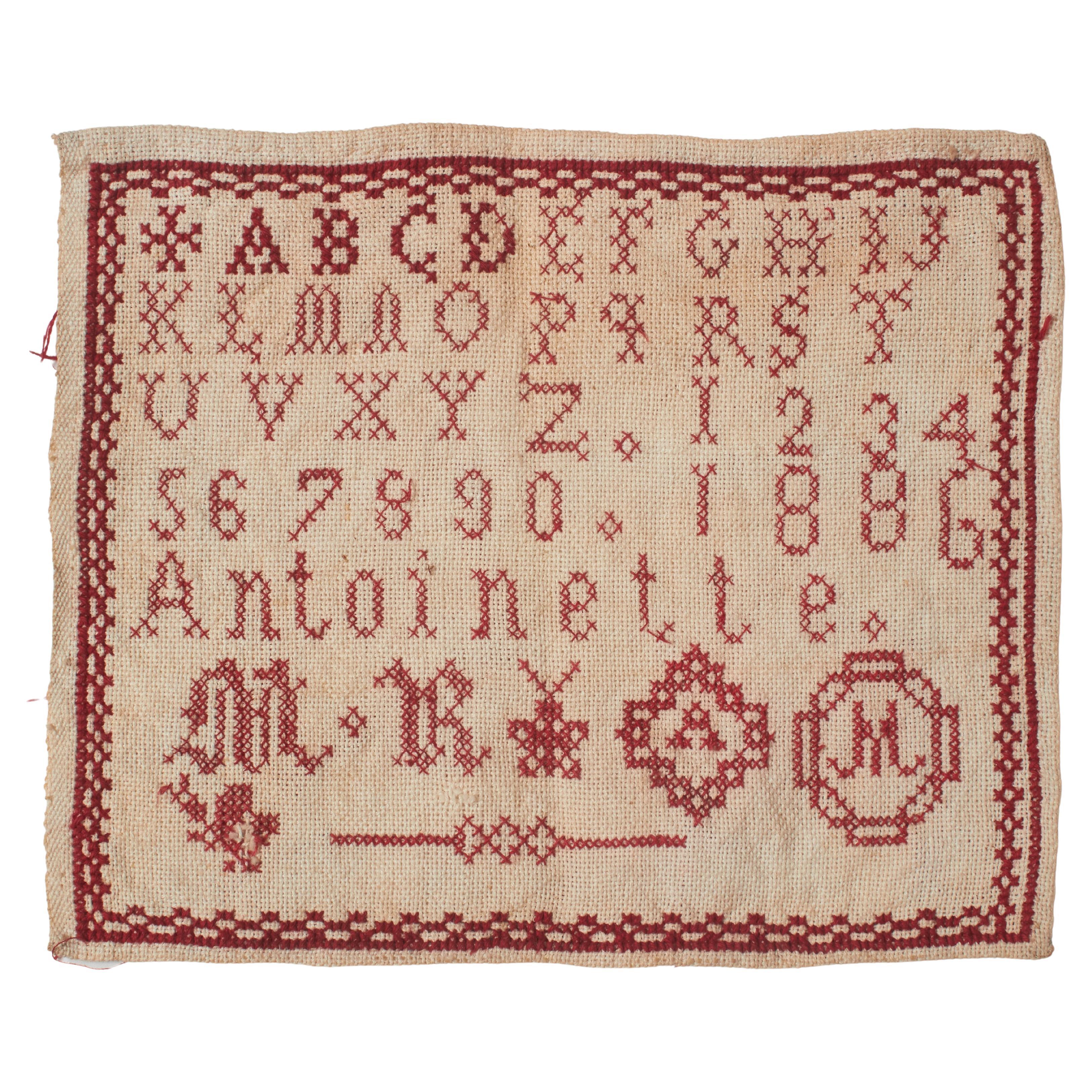 Antique 20th Century Cross-Stitch Sampler with Alphabet & Numbers For Sale