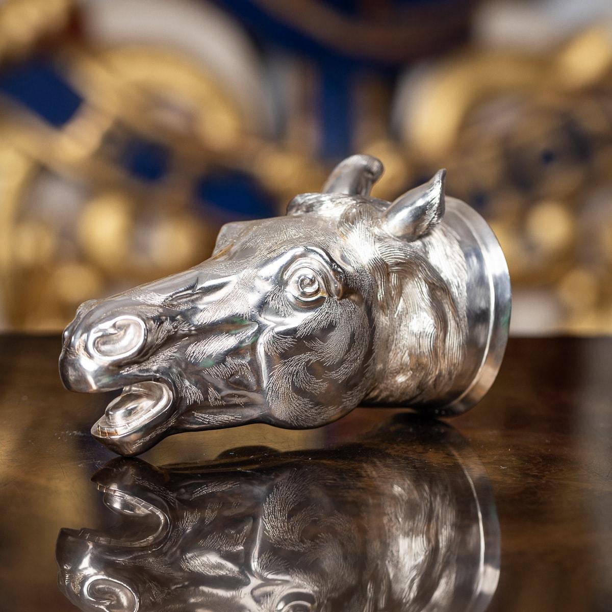 Antique early-20th Century Victorian solid silver stirrup cup, the head realistically cast as a horses head, with ears pricked, eyes wide open, plain collar and richly gilt interior. Victorian stirrup cups modelled as horse are extremely rare and