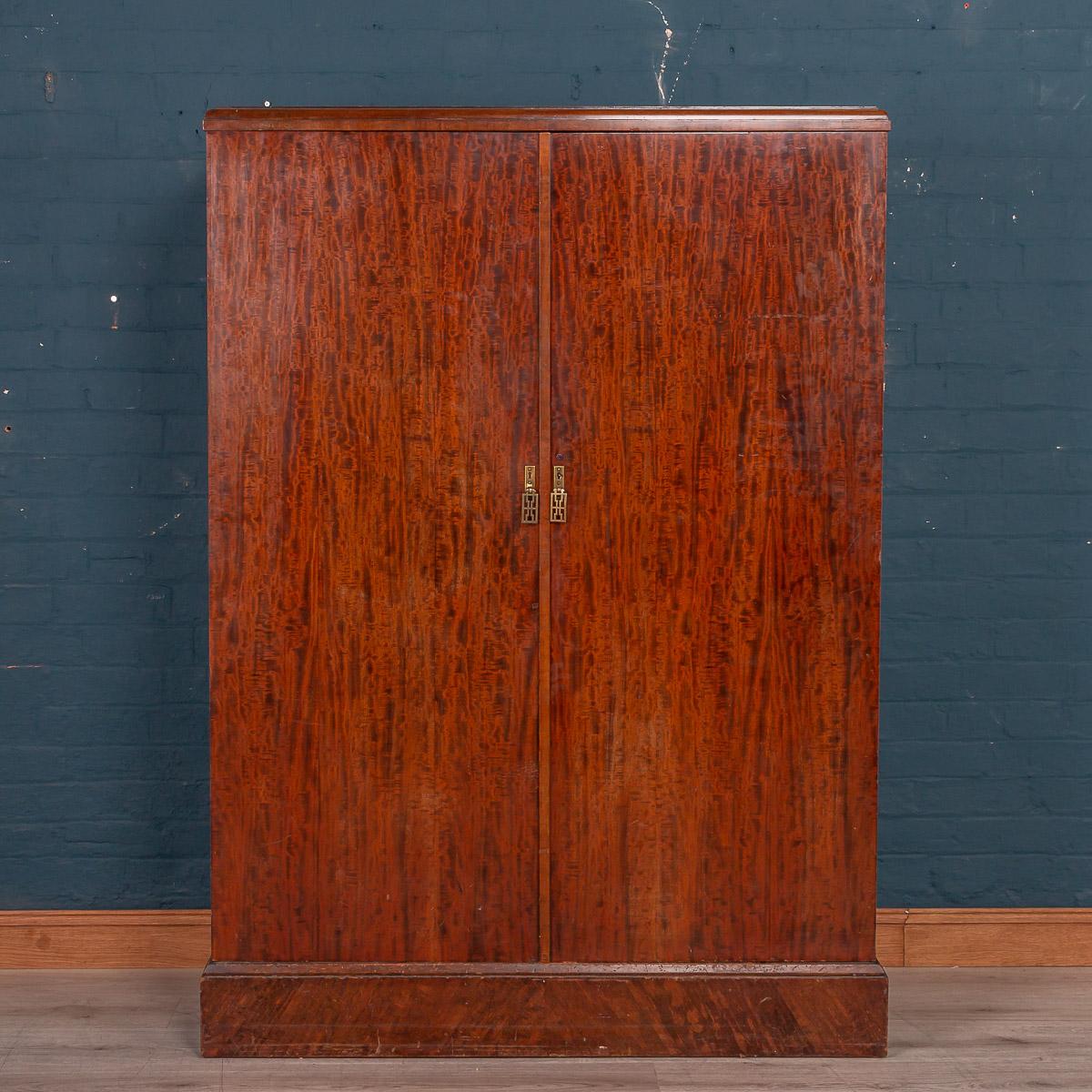 Antique 20th century English rare Art Deco wardrobe by Compactom. Beautiful piece of furniture, looking very anonymous when closed but once opened reveals a wonderful array of compartments for the gentleman’s wardrobe of the period, including
