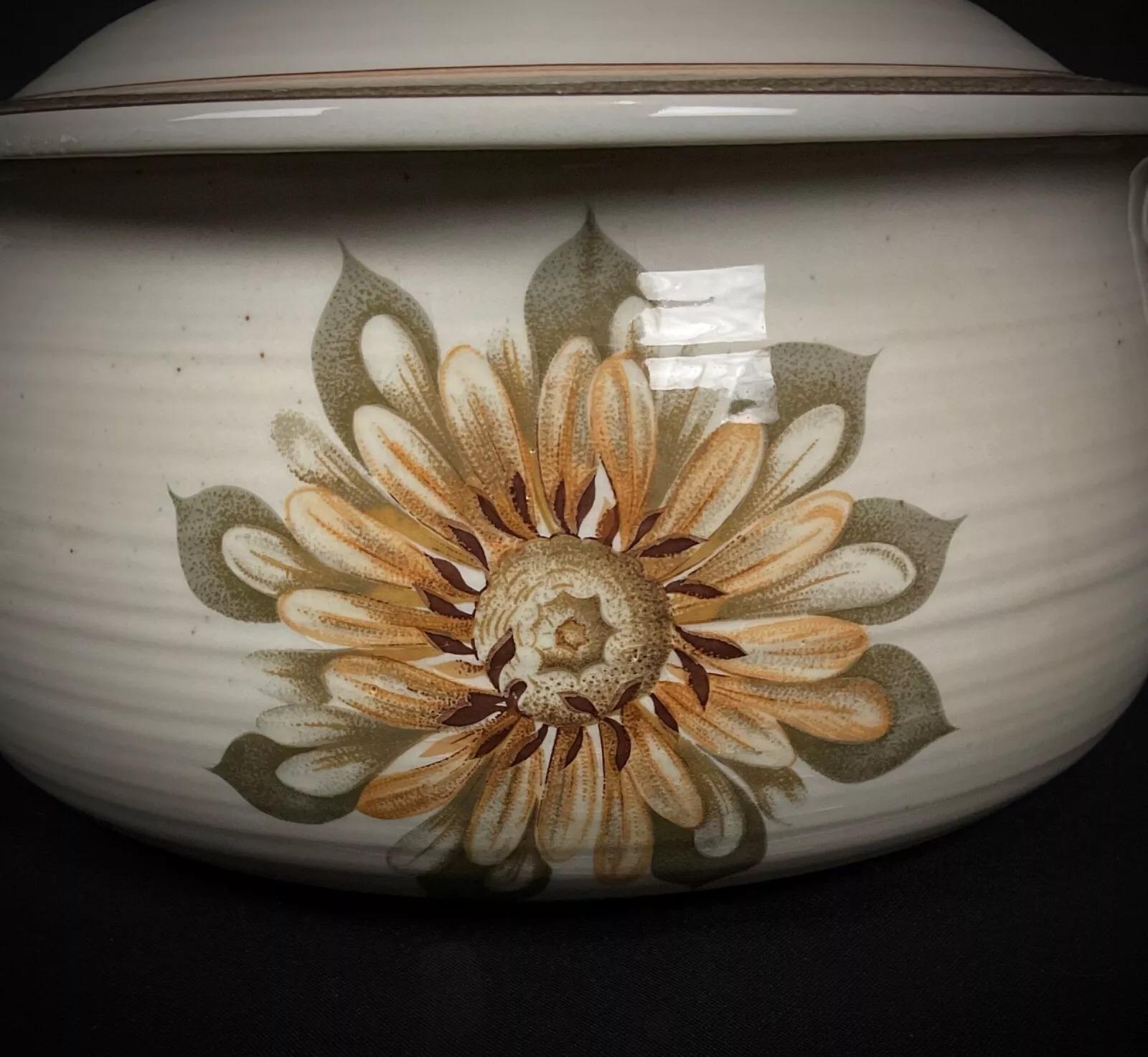 This exquisite stoneware soup tureen from La Vallée Castille, crafted in the 20th century, features the distinctive grand feu decoration—a high-temperature fired glaze known for its durability and deep, rich tones. A perfect example of French