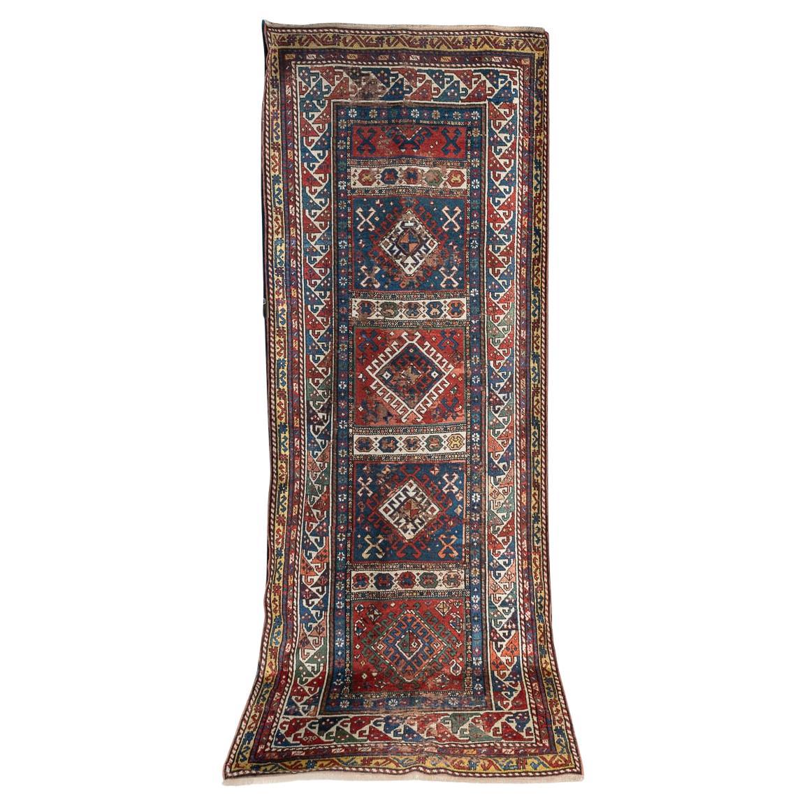 Antiquité 20ème siècle Tapis de course Kazak fait à la main c.1920 en vente