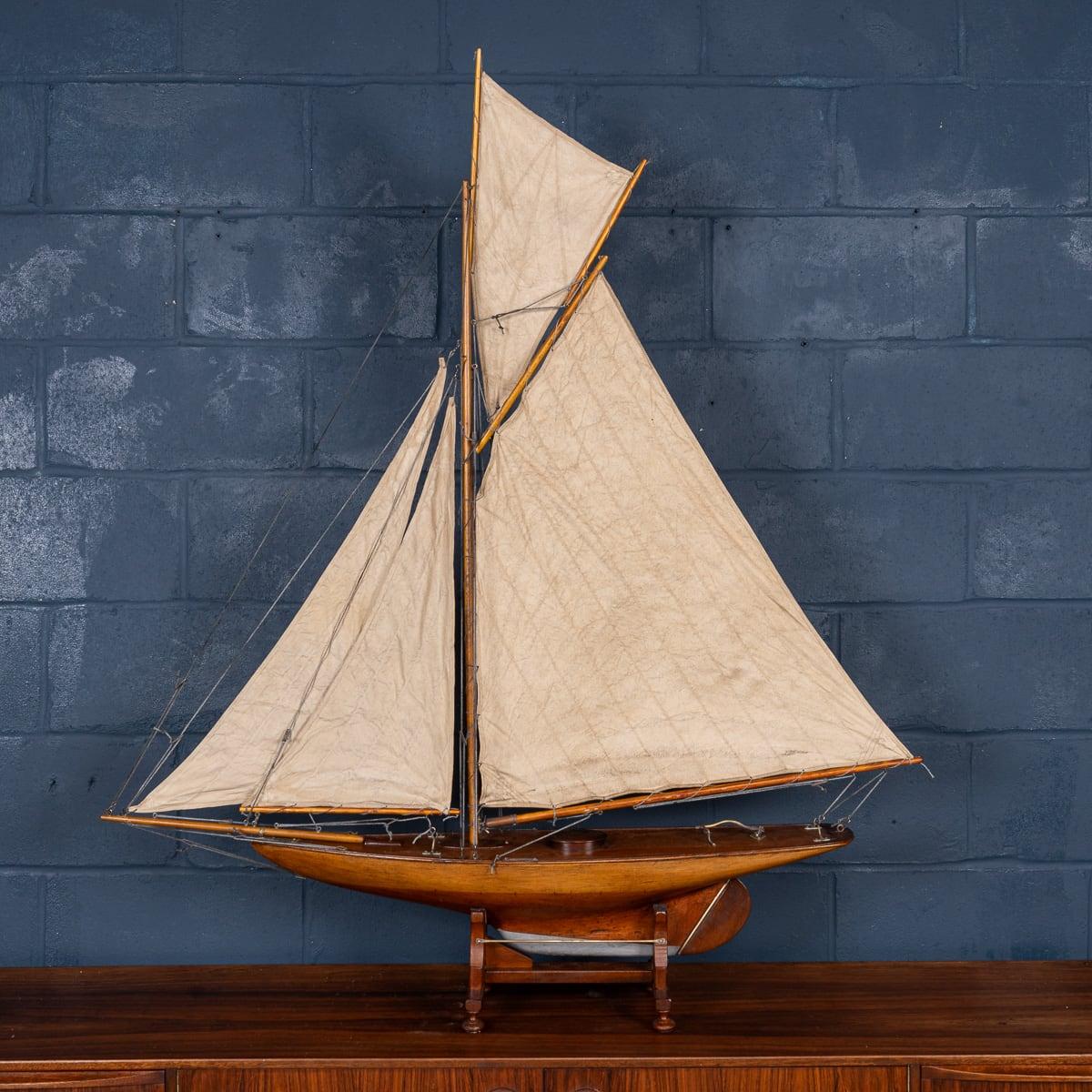 A fantastic antique gaff rigged cutter pond yacht, lovely carved hull dating to the first half of the 20th century. The yacht is an example of British pond racing yacht and would have raced against similar yachts in competitions, club against club,