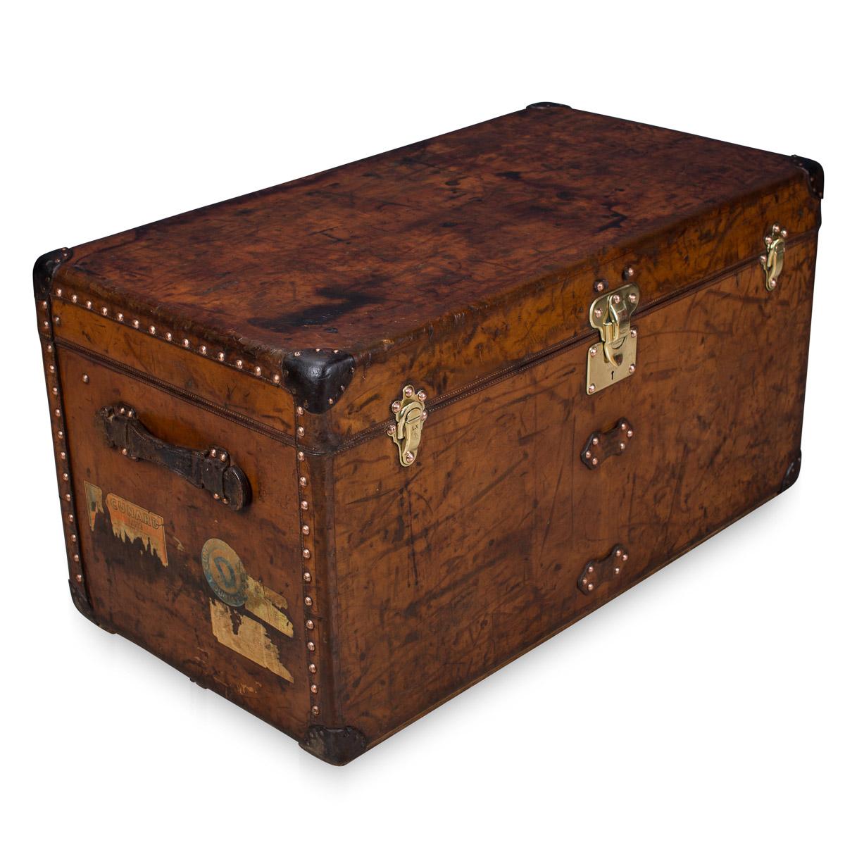 A very rare Louis Vuitton trunk dating from the early part of the 20th century, covered not in the world famous (but more common) monogram canvas but in a single piece of cow hide. These all-leather trunks were made by special order and Louis