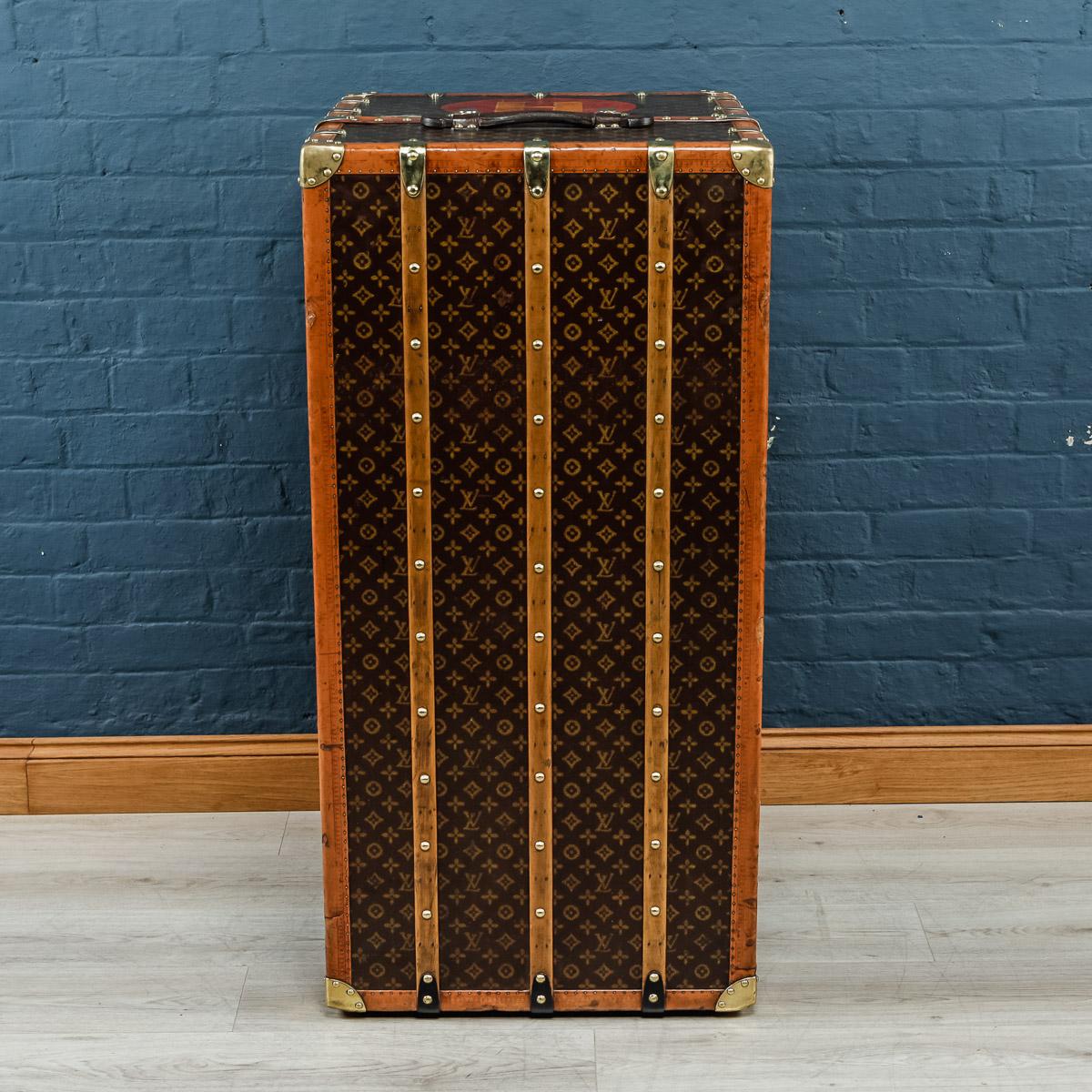 Desciption:

Stunning and most importantly complete, this early 20th century Louis Vuitton wardrobe trunk was the must have item of any elite traveler. Covered in the world famous LV monogrammed canvas, with its lozine borders and brass fitting it