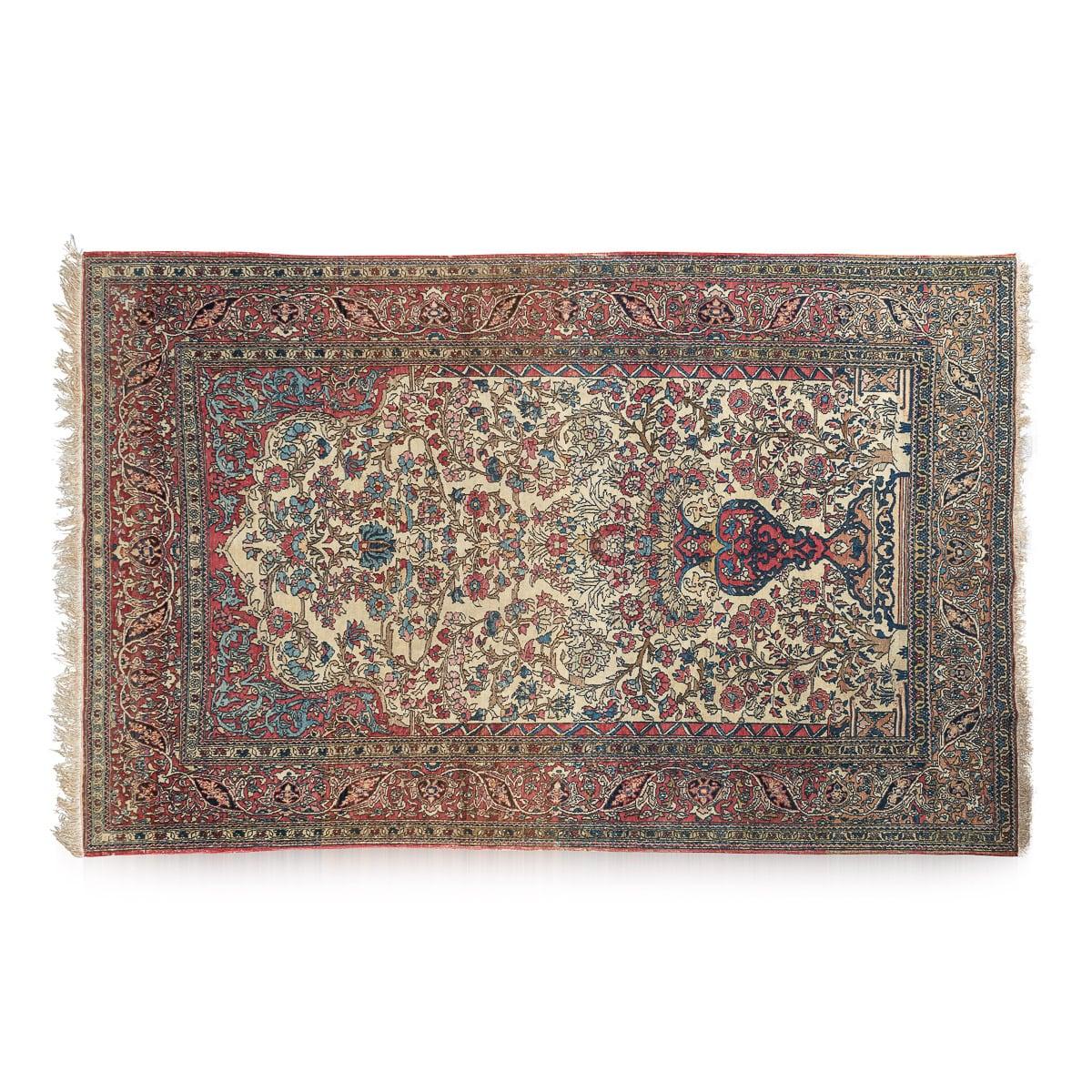 Antique early 20th Century handmade Persian Isfahan Mobarakeh rug. Featuring a large flower in the central medallion, complemented by intricately detailed borders. The carpet features a low pile (tight loops of material and shorter fibres) due to