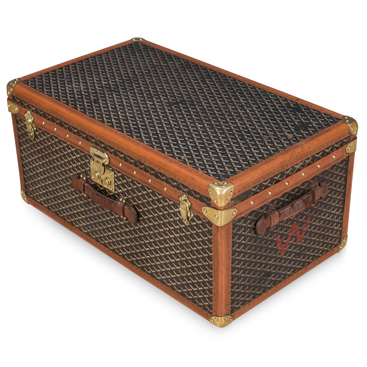 A small and delightful Goyard trunk dating to the early part of the 20th century, circa 1900-1910. Over recent years the brand has been relaunched and has taken the world of fashion by storm. The original E. Goyard firm was a trunk maker which