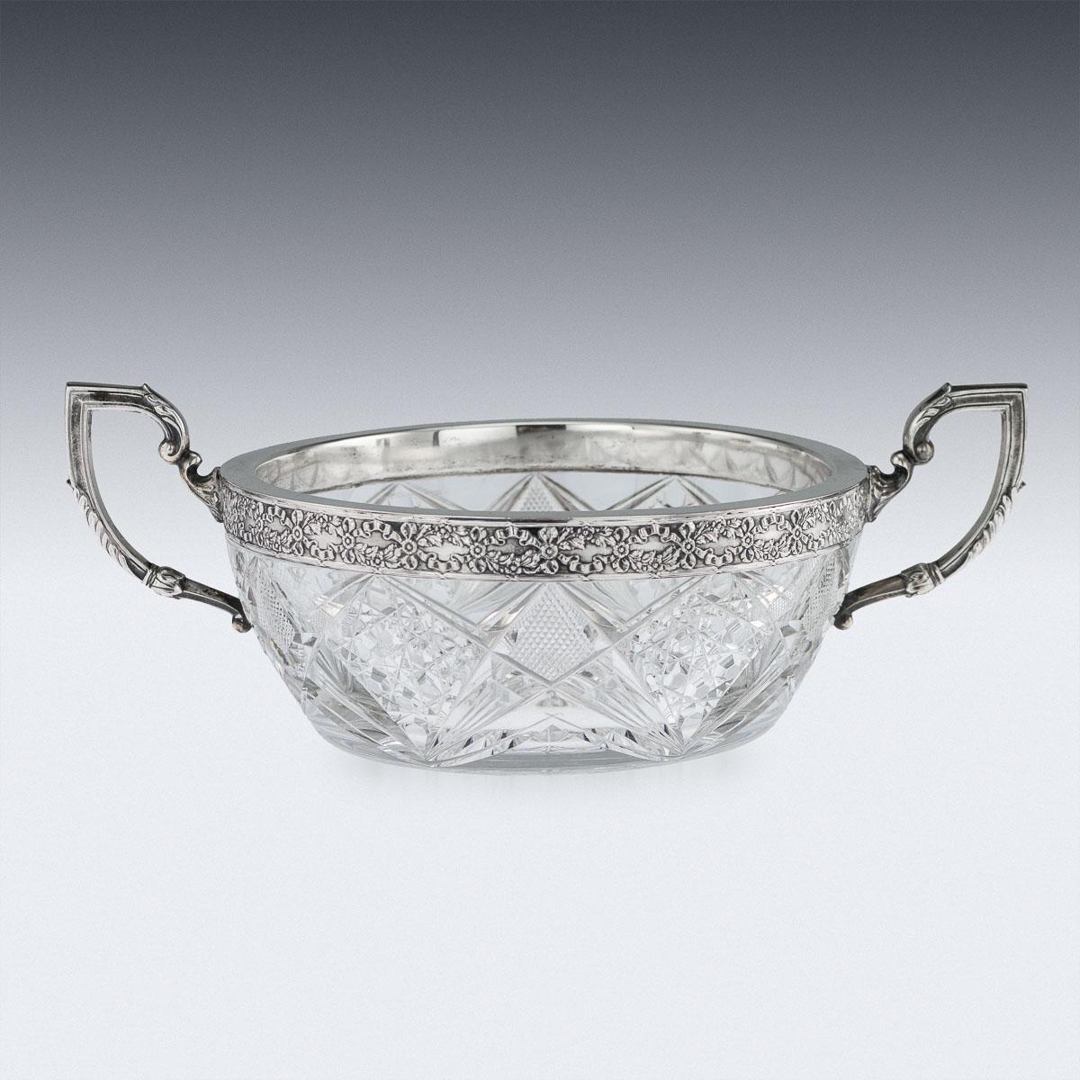 Antique early 20th century imperial Russian solid silver and cut-glass bowl, mounted with twin leaf capped handles, the boarder decorated with flowers, laurels and ribbons. Hallmarked Russian 84 silver (875 standard), St-Petersburg, year 1915-1917,