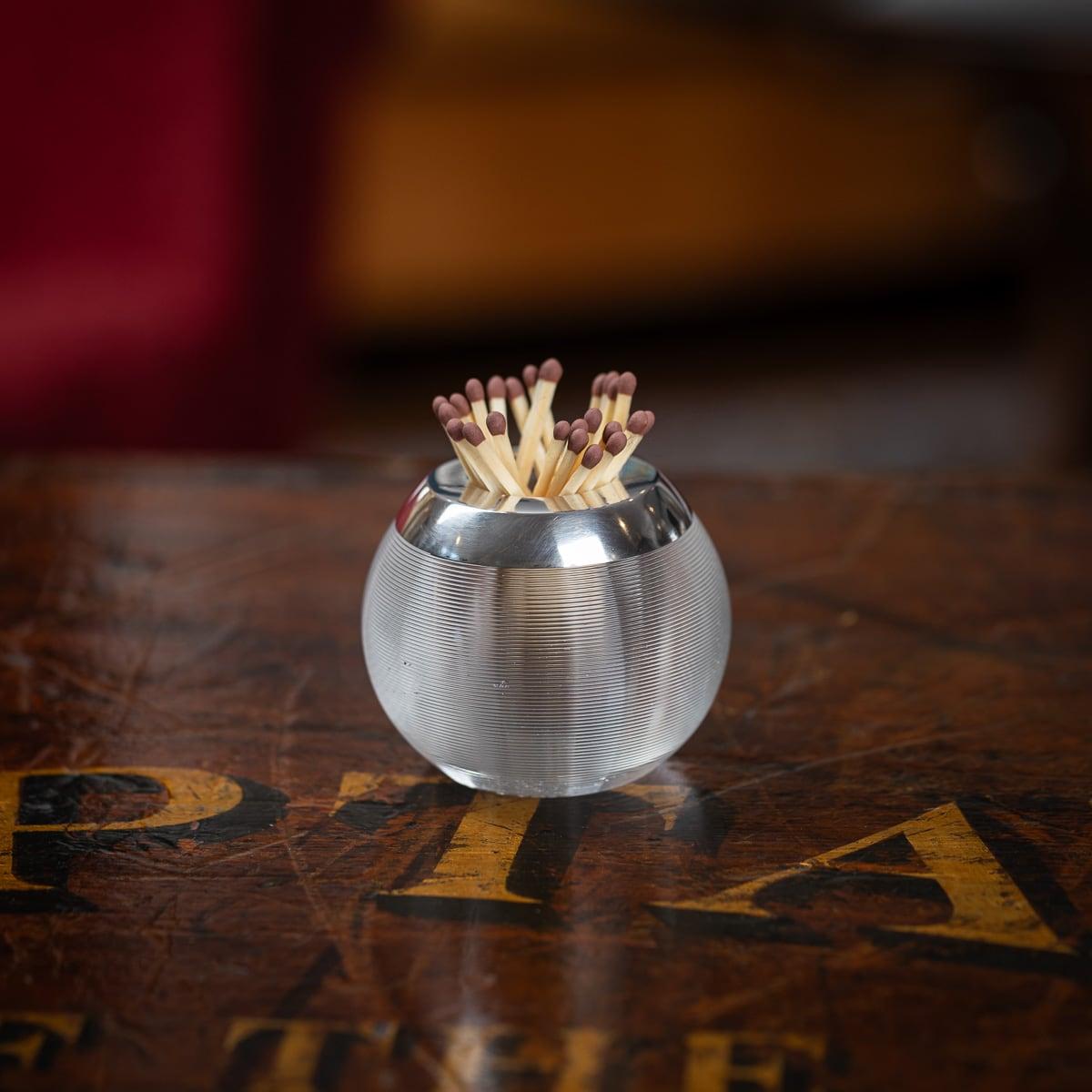 Antique 20th Century silver mounted and textured ribbed glass match striker. Of round shape, mounted with a plain silver collar. A must for any collector of Tobaconalia or just as a stand alone item, as useful today as it was the day it was