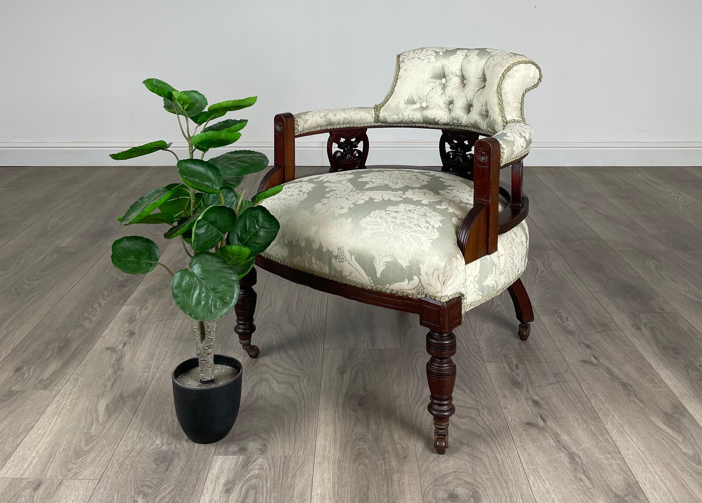 Gorgeous Edwardian Tub Chair
In mahogany
Stood on sturdy turned legs all having their original metal casters. The piece is upholstered in a light shade of green.
Beautifully decorated frame with various carvings displaying flowers and patterns.