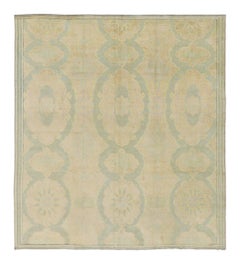 Antique 20th Century Turkish Hereke Rug in Soft Pastel Medallions - Rug & Kilim