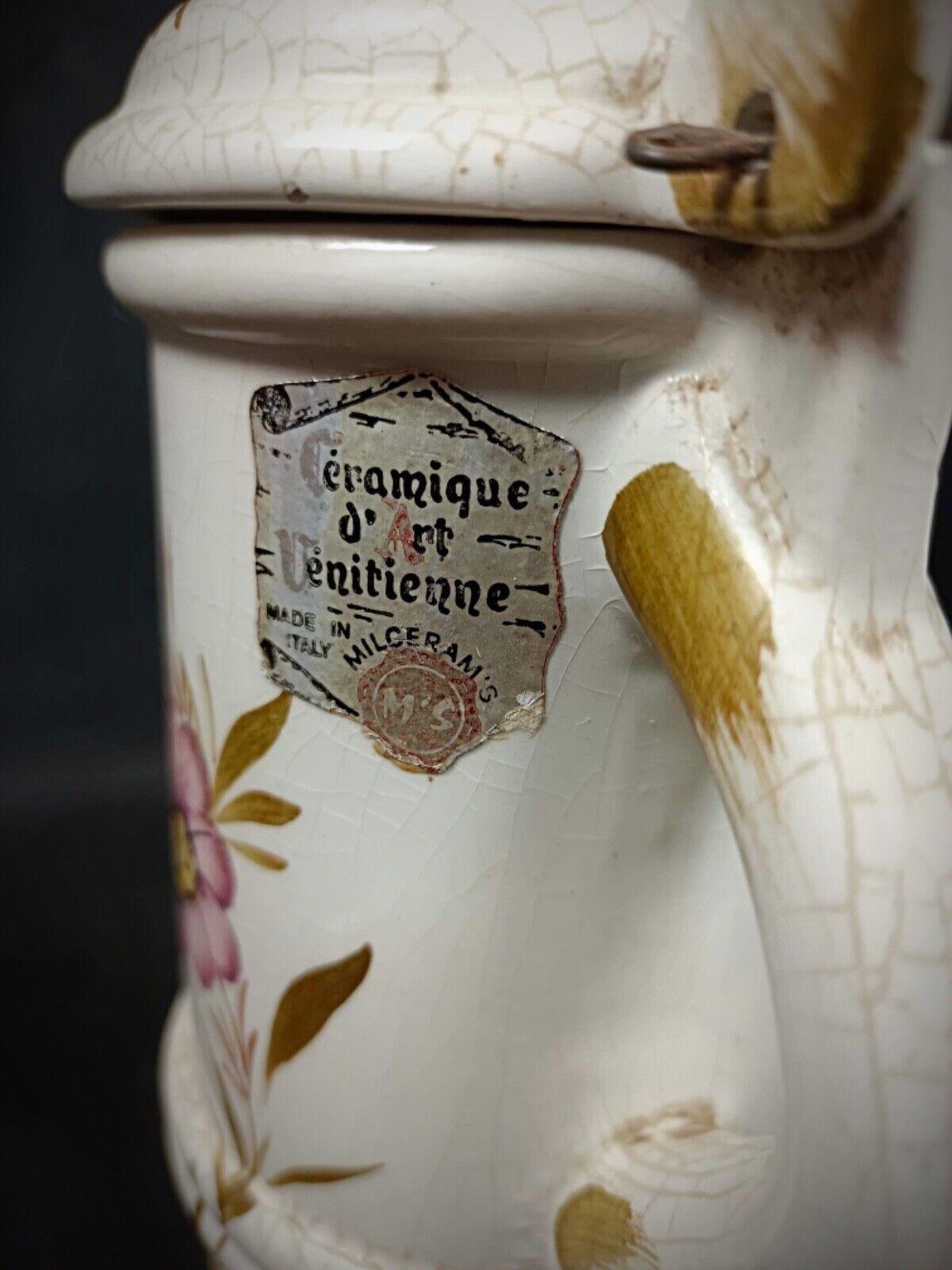 Add a touch of elegance to your collection with this exquisite 20th-century Venetian-style teapot. Crafted from crackled ceramic, this teapot features intricate artistry typical of Venetian ceramics, making it a standout piece for decorative