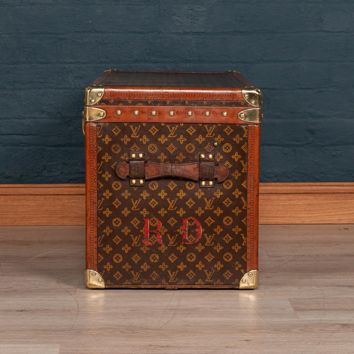 A very rare hat trunk by Louis Vuitton, made in France, circa 1930. The trunk opens to reveal a removable tray for two top hats and underneath the space for a further three top hats. Of wonderful proportions, this trunk is a superb example of an