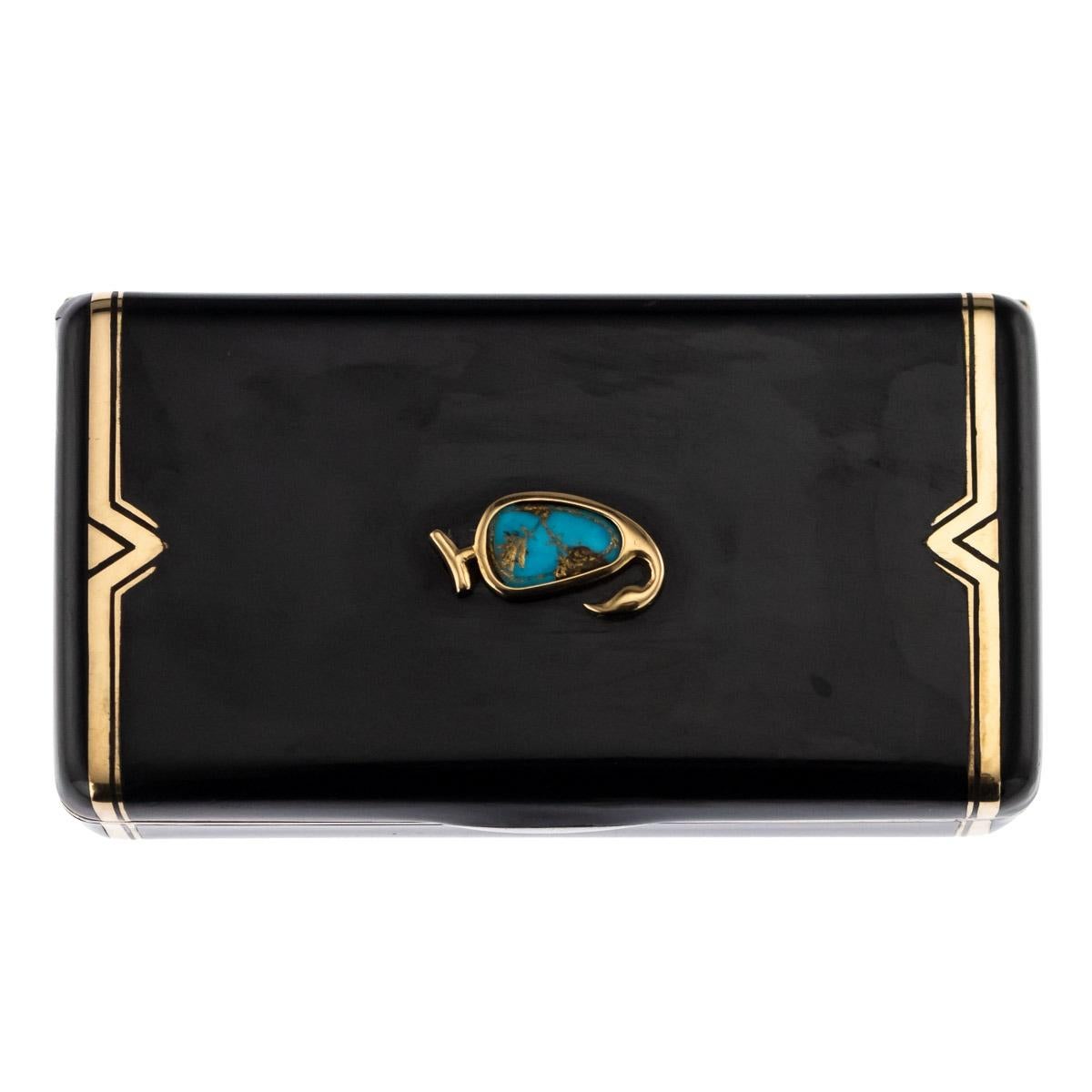 Antique early-20th century French Cartier Art Deco 18-karat gold vanity case, of rectangular form with rounded corners, the lid set with a carved fruit shaped turquoise stone in gold setting, the whole box is applied with black lacquer and Art Deco