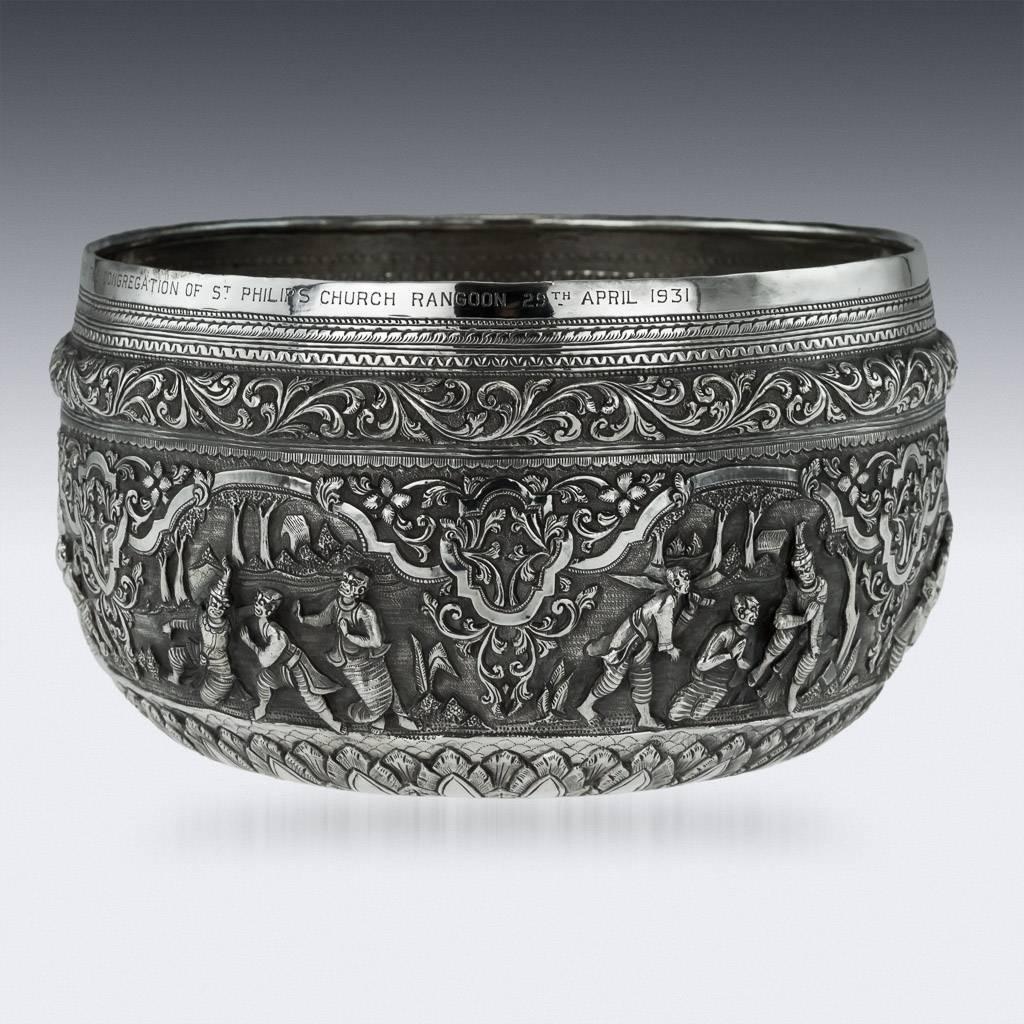 Antique 20th century exceptional Burmese, Myanmar solid silver thabeik bowl, repousse' decorated in high relief depicting different traditional scenes from the Burmese mythology, showing very detailed figures set against a chiselled matted