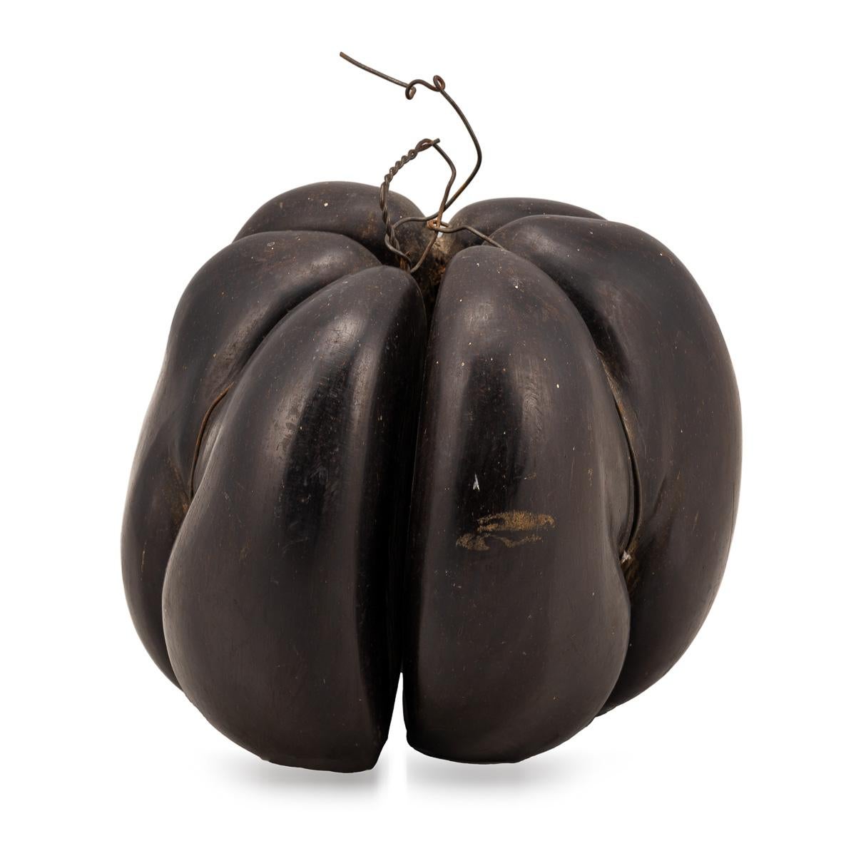 This late Victorian Coco de Mer, or sea coconut, stands out as an extraordinary and highly unusual piece for any serious collector. Polished to a high gloss finish, it possesses an undeniable allure due to its rarity and distinctive form.

While