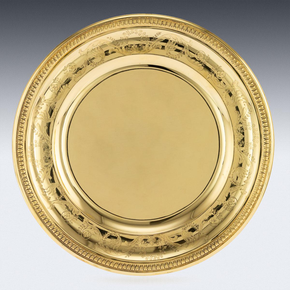 Antique 20th century French solid silver-gilt important set of 10 dessert plates and 2 serving dishes, each of circular form, richly gilt, the border is engraved with laurel leaf band and engraved with floral scrolls, very elegant design. Each piece