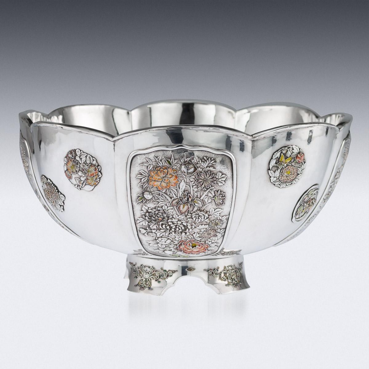 Antique early-20th century Japanese Meiji period solid silver floral bowl, exceptional and magnificent quality, double walled on a shaped spreading base, sides applied with silver and enameled panels decorated with chrysanthemum bouquets and water
