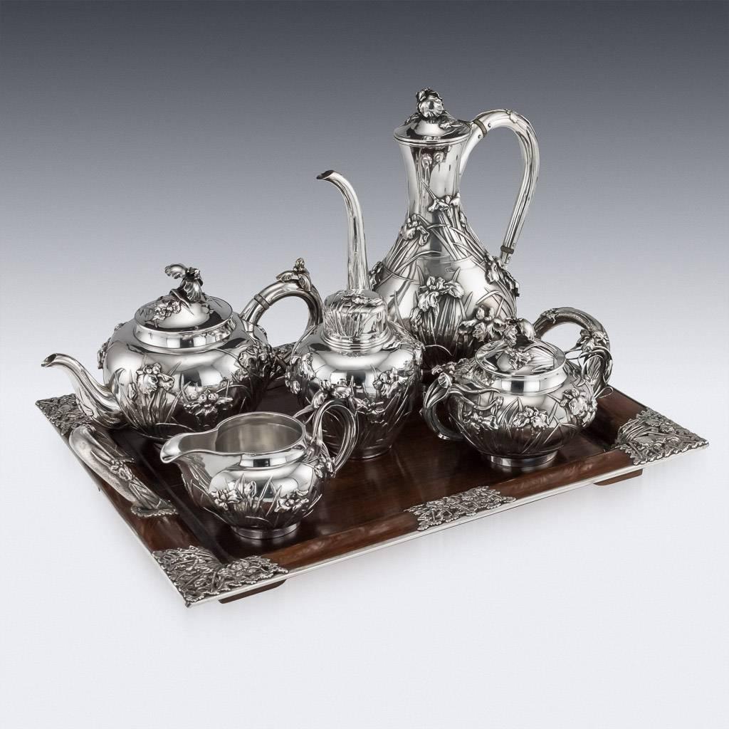 Antique early 20th century Japanese solid silver large five-piece tea and coffee service on silver mounted wooden tray, exceptional and magnificent quality, double walled, embossed and applied with Iris flowers in high relief, with C-form handles