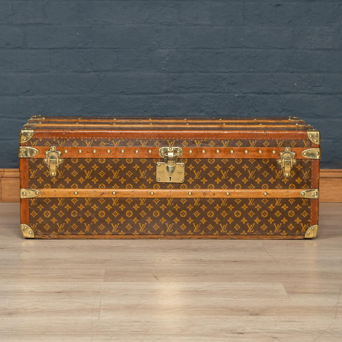 Antique early 20th century Louis Vuitton trunk covered in the world famous LV monogrammed canvas, with its lozine borders and brass fitting this trunk would have been the top of the line even at the time of purchase some 100 years ago. This