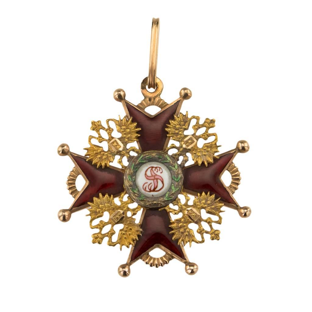 Antique 20th century Russian Imperial Order of St Stanislaus 3rd Class (Civil) badge / medal, the cross covered in translucent red enamel, comes in its original box. The badge is Hallmarked Russian Imperial Gold 56 (585 standard), St. Petersburg,