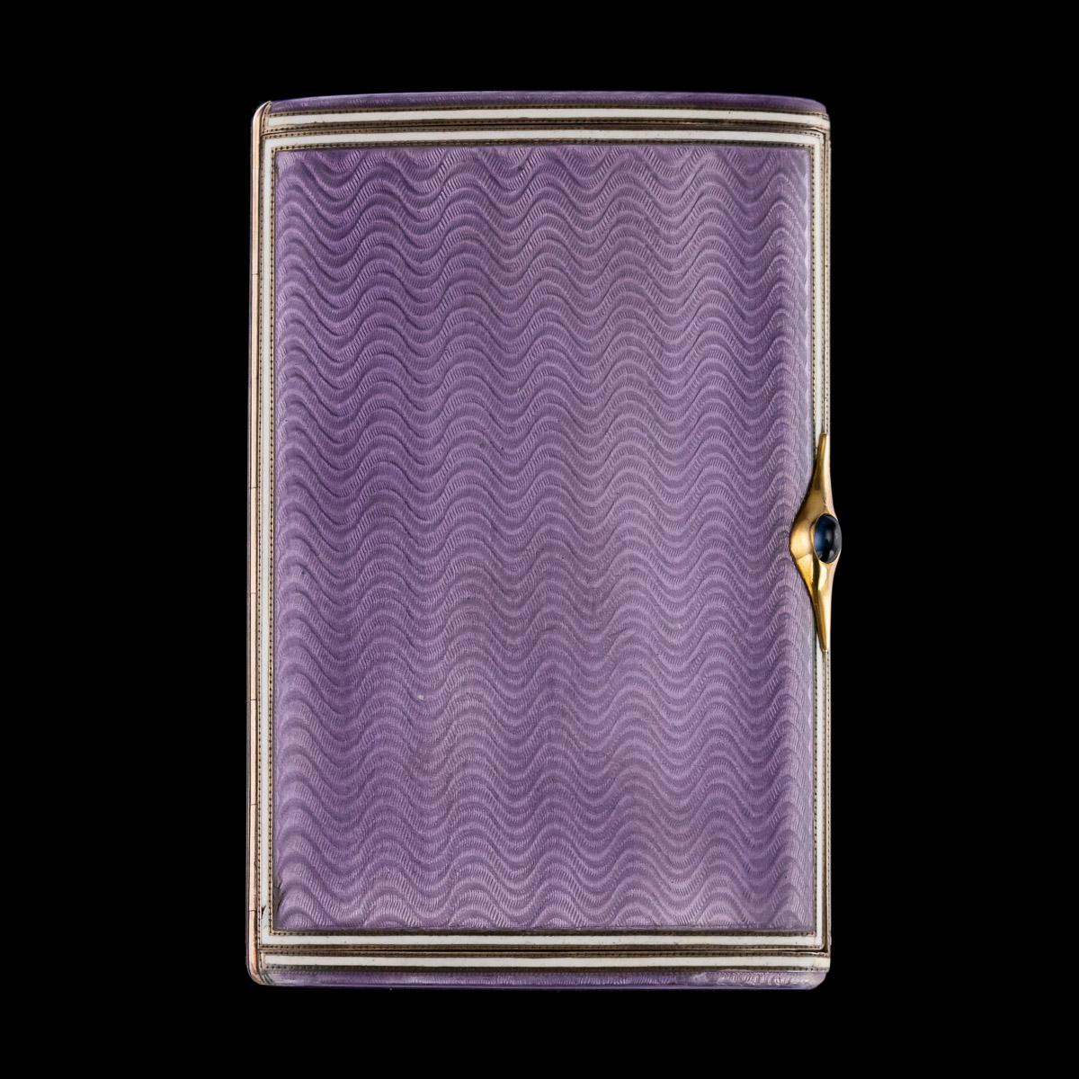 Antique early 20th century imperial Russian silver-gilt and guilloche enamel cigarette case, rectangular form with rounded corners, body enameled in translucent purple over a engine-turned ground, the gold thumb piece mounted with finely set