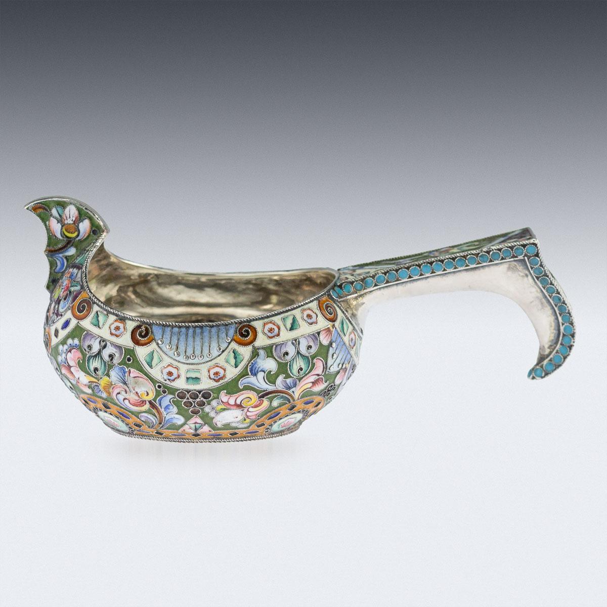 Antique early 20th century Imperial Russian solid silver and shaded cloisonné' enamel Kovsh, of traditional oval form, with raised prow and hook handle, the body beautifully decorated with various shaded polychrome cloisonné' enamel with stylised