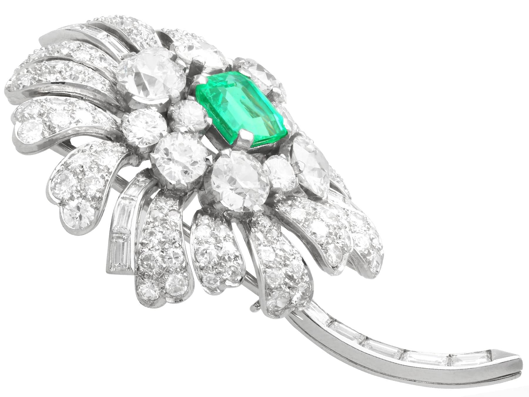 Women's or Men's Antique 2.10Ct Emerald and 7.73Ct Diamond Platinum Floral Brooch Circa 1900 For Sale