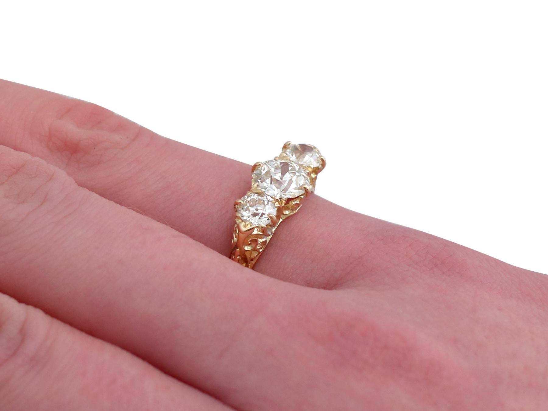 Antique 2.16 Carat Diamond Yellow Gold Three-Stone Ring 3