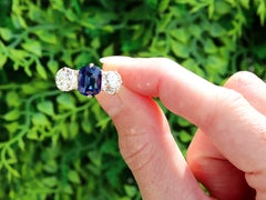 Antique 2.17 Carat Basaltic Sapphire 2.52 Carat Diamond Trilogy Engagement Ring