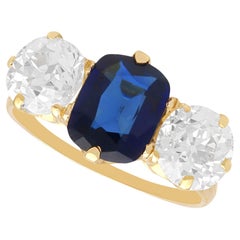 Anello antico con zaffiro basaltico da 2,17 carati e diamante da 2,52 carati, oro giallo 18 carati