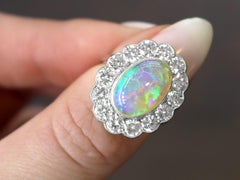 Antique 2.19 Carat White Opal and 2.36 carat Diamond Cluster Ring in Platinum