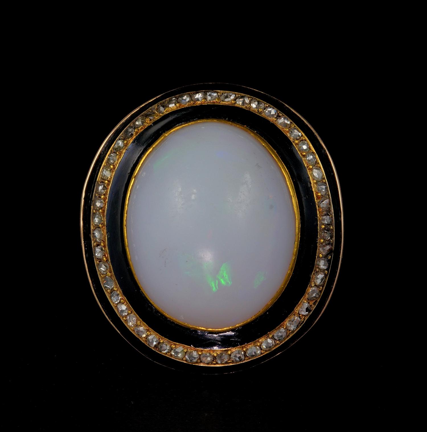 Distinction in the Georgian Era

This magnificent Georgian period ring is an unique and one off, hardly seen of this exceptional features
The real star of this rare ring is the huge Natural Opal set as focal point
Mostly milky white and so unusual,