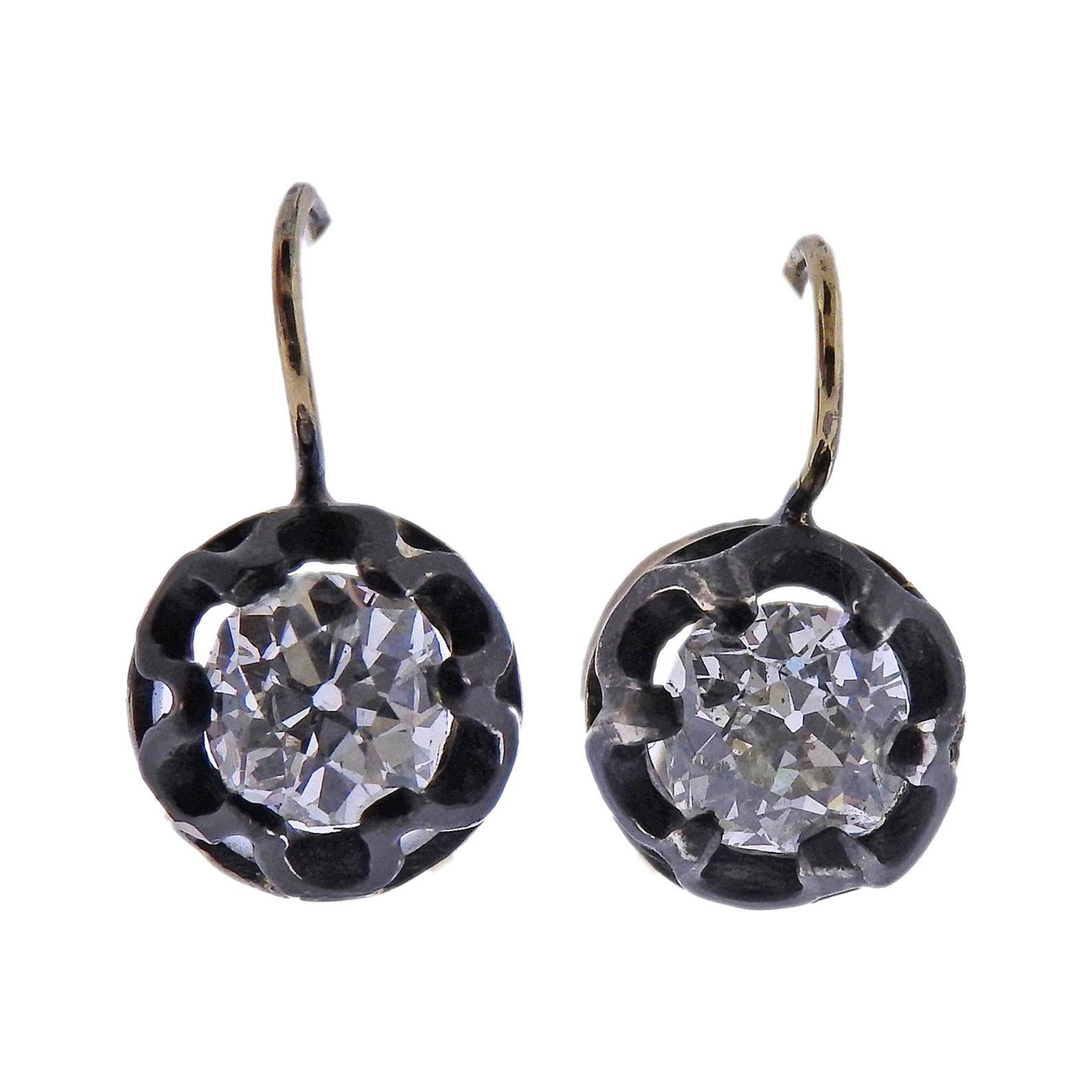 Antique 2.20 Carat Old Mine Cut Diamond Gold and Silver Earrings For Sale