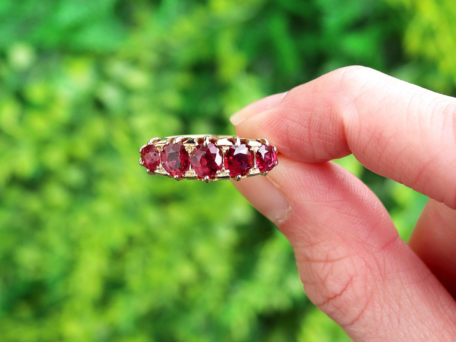 A fine and impressive antique 2.20ct ruby and 18 karat yellow gold five stone ring; part of our antique five stone ring collections.

This fine and impressive antique ruby ring has been crafted in 18k yellow gold.

The impressive shaped multi-claw,