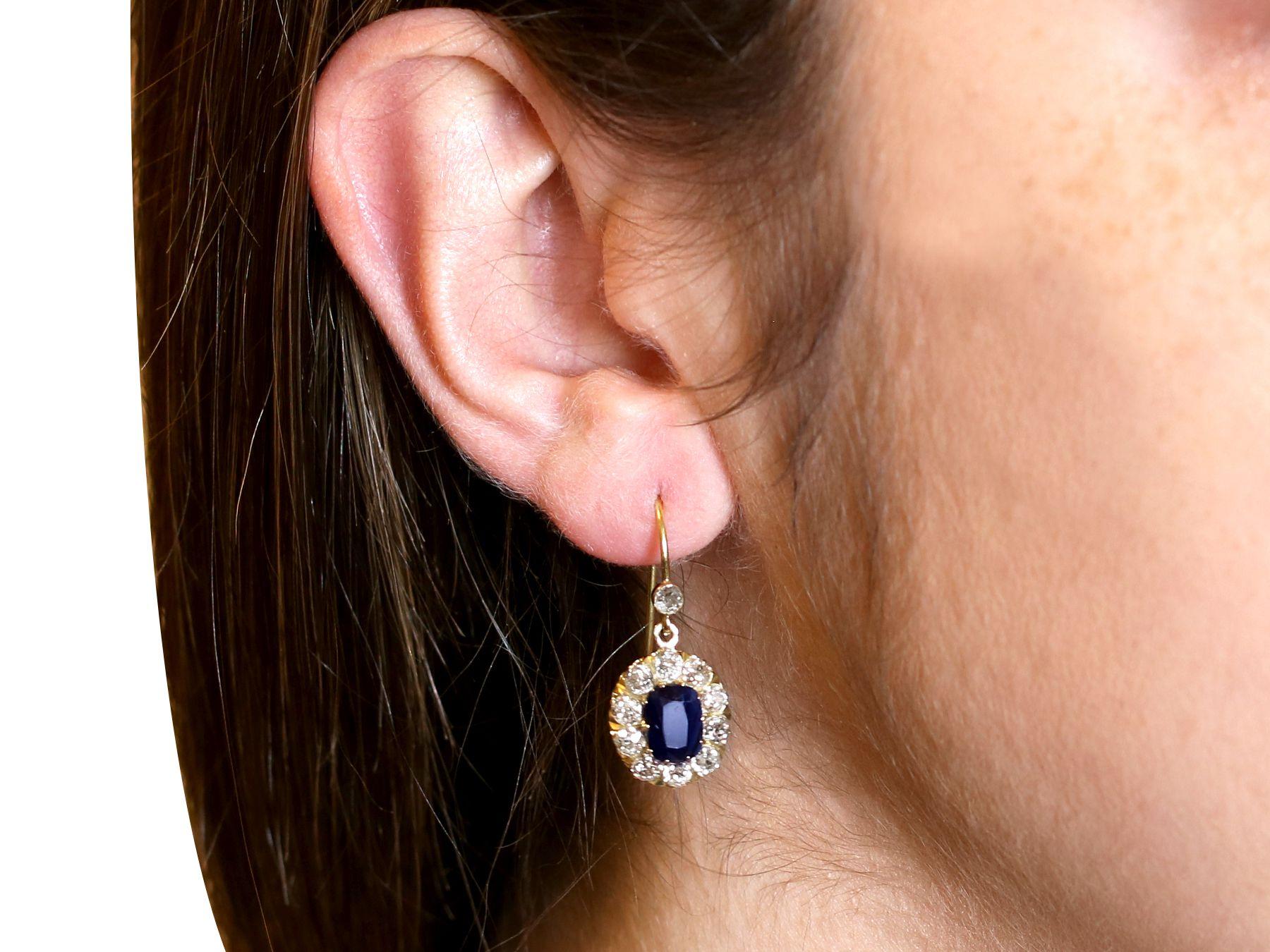 A stunning, fine and impressive pair of antique 2.22 carat blue sapphire and 1.20 carat diamond, 15 carat yellow gold drop earrings; part of our antique jewellery and estate jewelry collections

Description
These stunning, fine and impressive