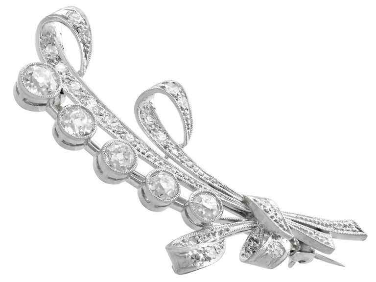 A stunning antique 2.23 carat diamond and platinum lily of the valley brooch; part of our diverse antique jewelry and estate jewelry collections

This stunning, fine and impressive diamond brooch has been crafted in platinum.

The floral spray