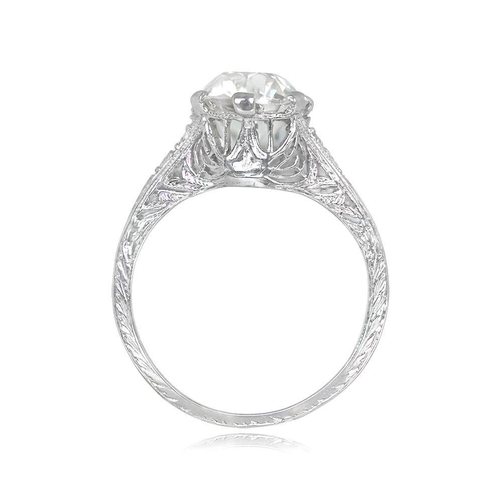 Presenting a splendid antique engagement ring showcasing a magnificent old European cut diamond, weighing around 2.28 carats, with an L color grade and VS2 clarity. Set delicately in prongs, this diamond exudes timeless elegance. The ring's allure