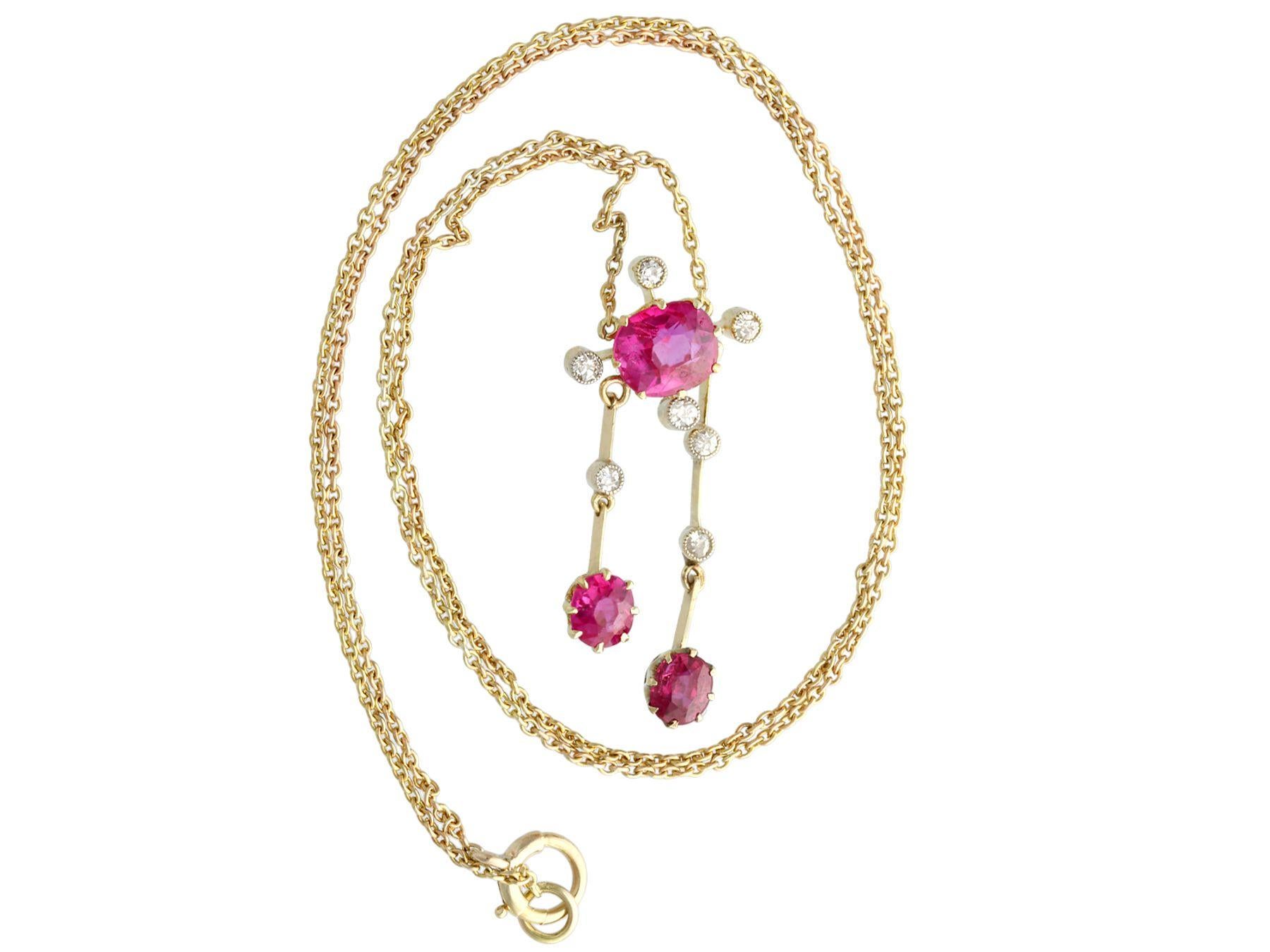 A stunning antique 2.29 carat ruby and 0.21 carat diamond, 15k yellow and white gold drop pendant; part of our diverse antique jewelry and estate jewelry collections.

This stunning, fine and impressive ruby and diamond drop necklace has been