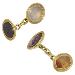 Antique 22kt yellow gold cufflinks, each adorned with Roman 4 carved hardstone