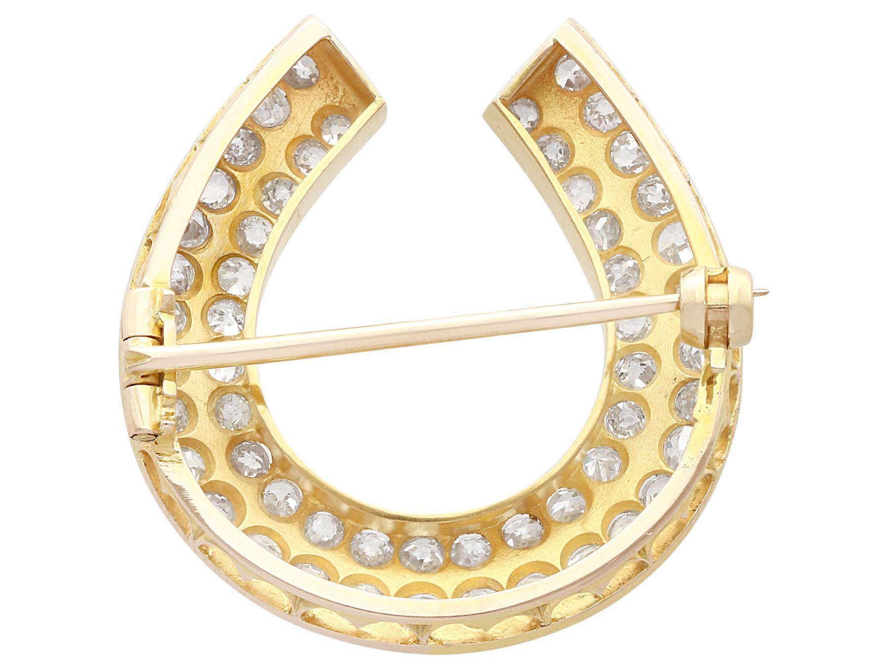 Round Cut Antique 2.36 Carat Diamond and Yellow Gold Horseshoe Brooch For Sale