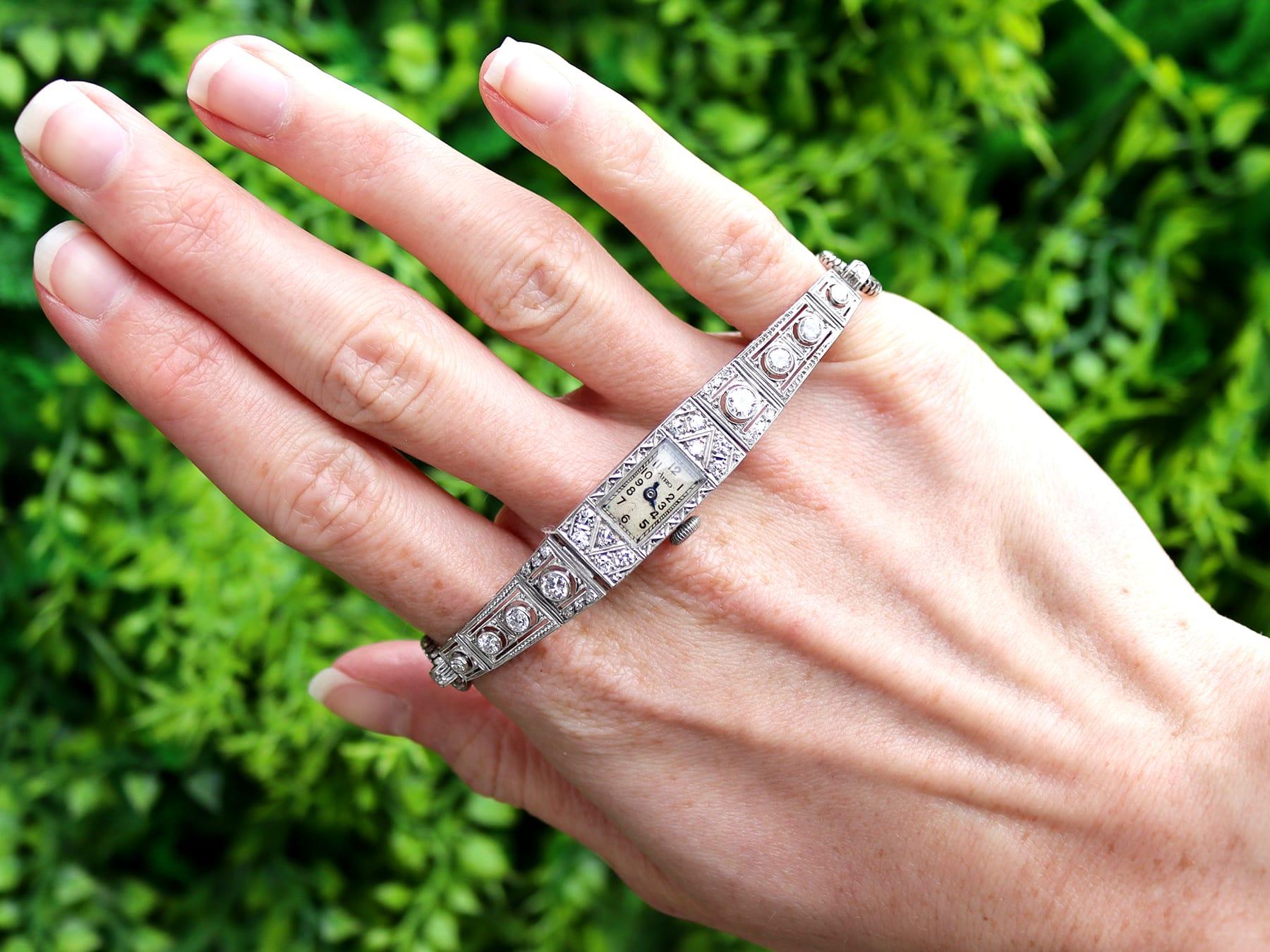 A stunning, fine and impressive antique 1920s 2.36 carat diamond, platinum and 9 karat white gold cocktail watch; part of our collection of diamond watches.

This stunning, fine and impressive antique diamond cocktail watch has been crafted in
