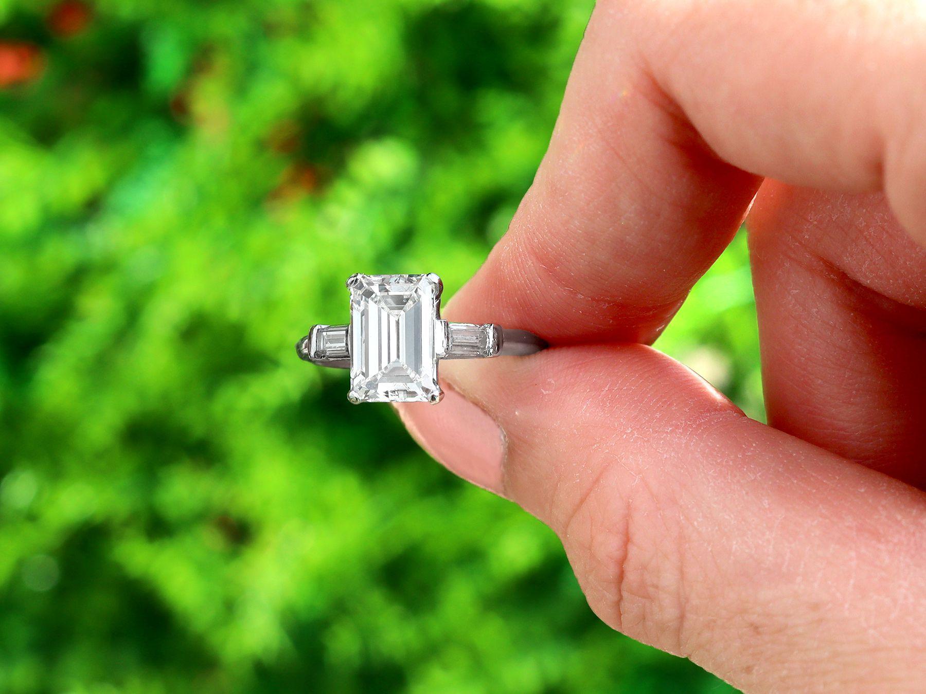 A stunning, fine and impressive antique 2.38 carat emerald cut diamond solitaire ring in platinum; part of our antique engagement ring collections. 

This stunning, fine and impressive antique diamond engagement ring has been crafted in