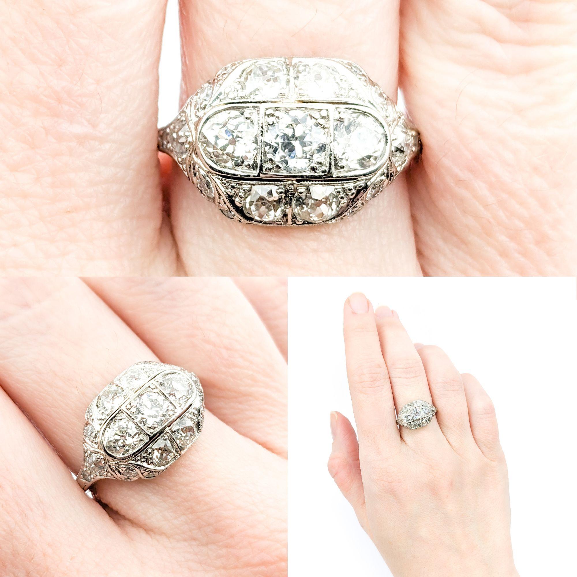 Antique 2.40ctw Mine Cut Diamonds Ring In Platinum

Presenting an exquisite Antique Ring, meticulously crafted from 900pt platinum. This ring showcases a stunning centerpiece of 2.40ctw mine cut diamonds, set within an Art Deco Shield design that